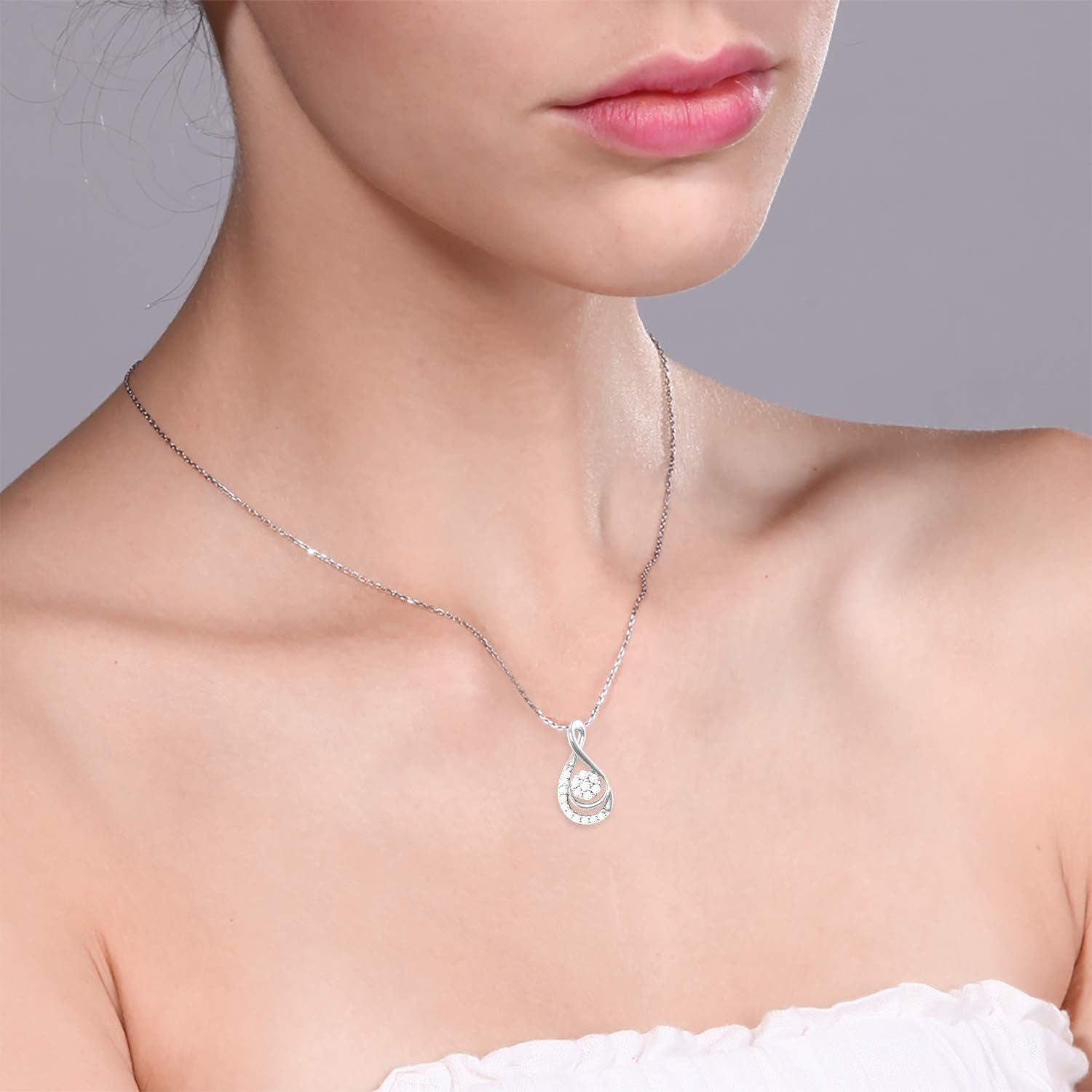10Kt White Gold Womens round Diamond Flower Cluster Teardrop Pendant 1/10 Cttw