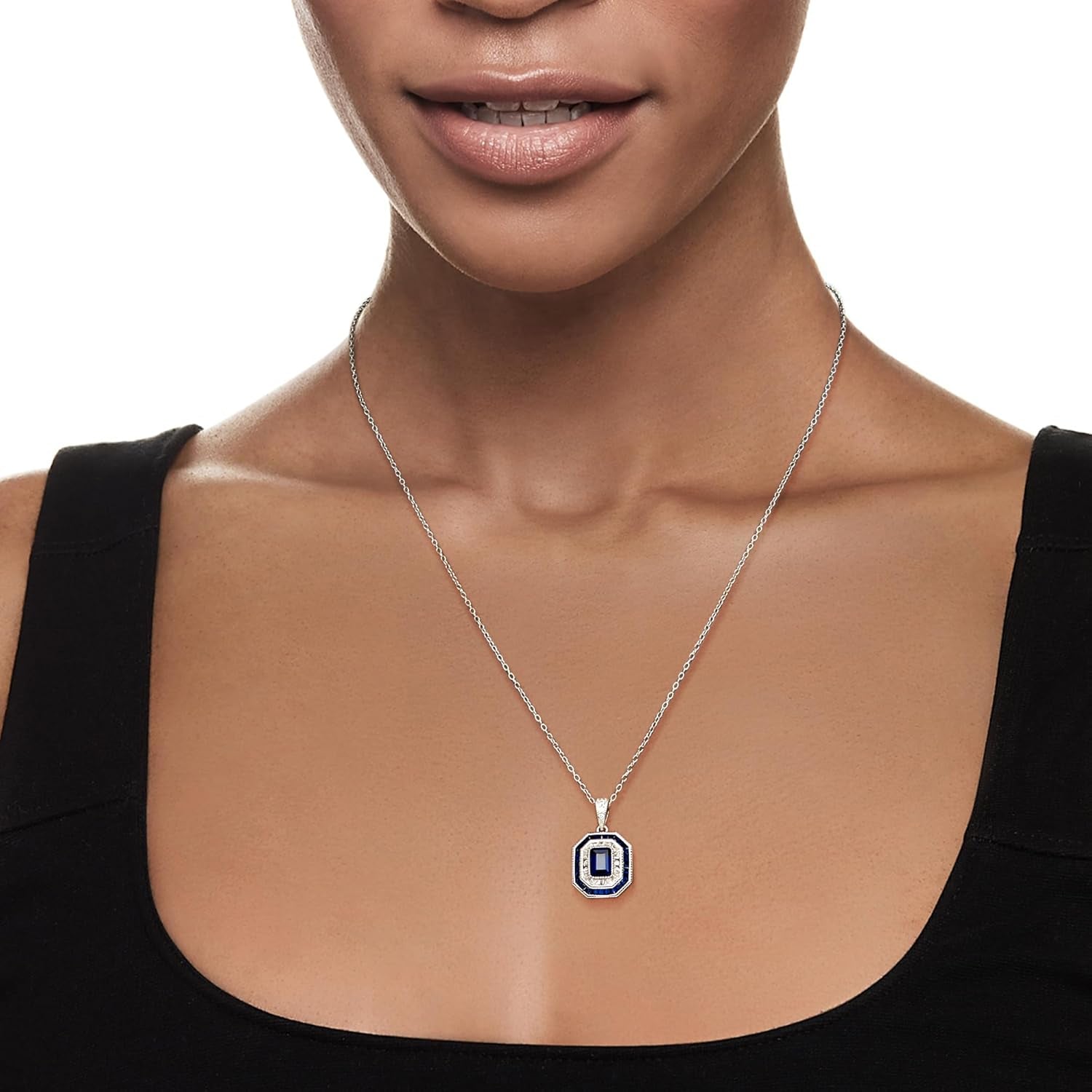 1.25 Carat Simulated Sapphire and .60 Ct. T.W. Lab-Grown Blue Spinel Pendant Necklace with .32 Ct. T.W. Czs in Sterling Silver. 18 Inches
