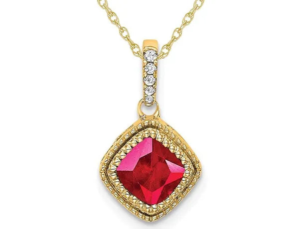 2/5 Carat (ctw) Natural Ruby Pendant Necklace in 14K Yellow Gold with Diamonds and Chain